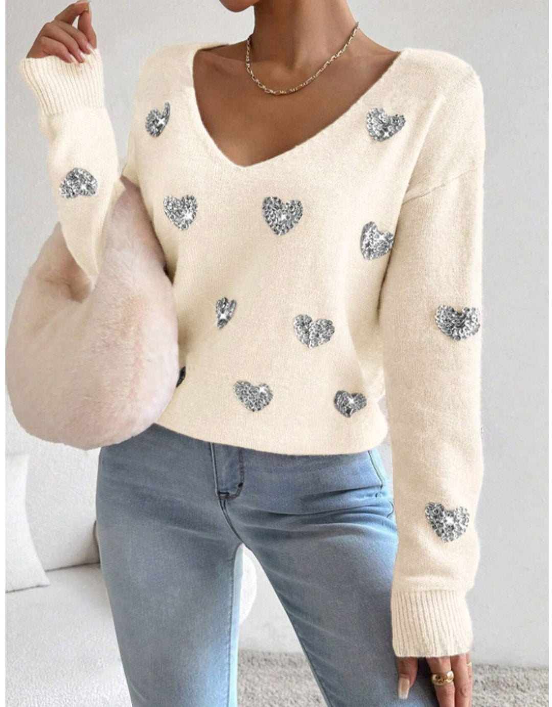 Kvindernes oversized sweatervest med dyb V-hals og hjerte motiv Stilla
