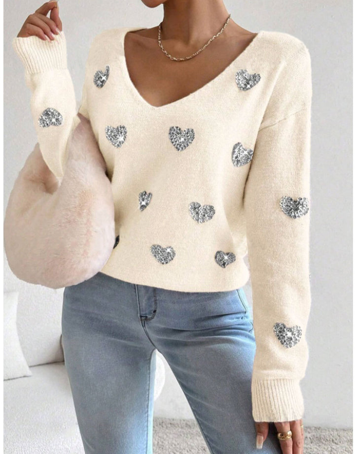 Kvindernes oversized sweatervest med dyb V-hals og hjerte motiv Stilla