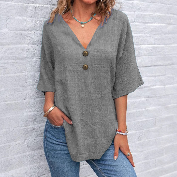 Dame V-hals bluse med knapdetaljer Skovae