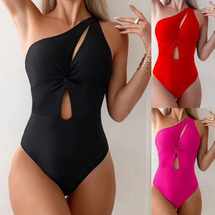 Dame one-piece badedragt med asymmetrisk snit og knudeformet detalje Stilla