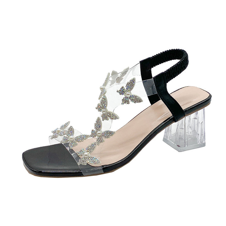 Dame sandaler med funklende sommerfugleapplikationer og gennemsigtigt design Stilla