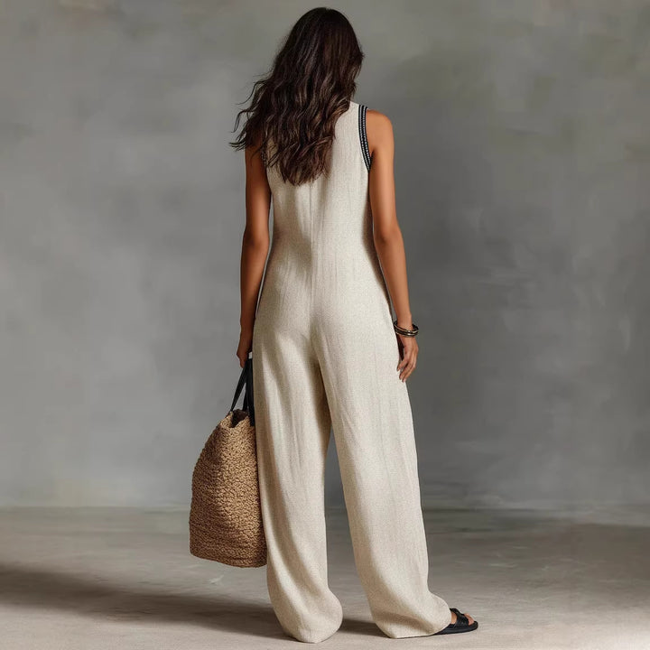Dame luftig jumpsuit med elegant V-halsudskæring og broderet krave Skovae