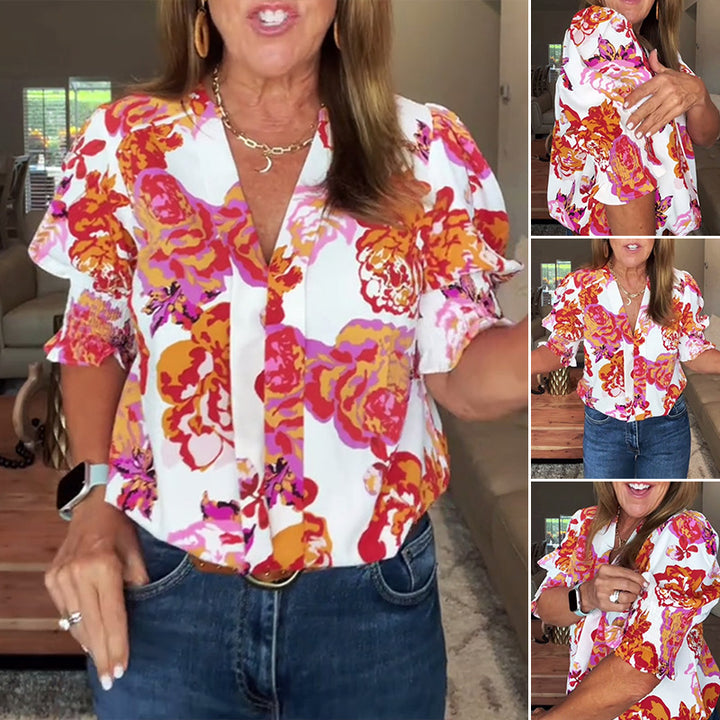 Damebluse med blomsterdesign og voluminøse ærmer Stilla