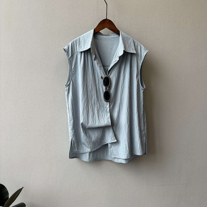 Dame casual blouse med elegant ståkrave og unik knapdetaljering Stilla