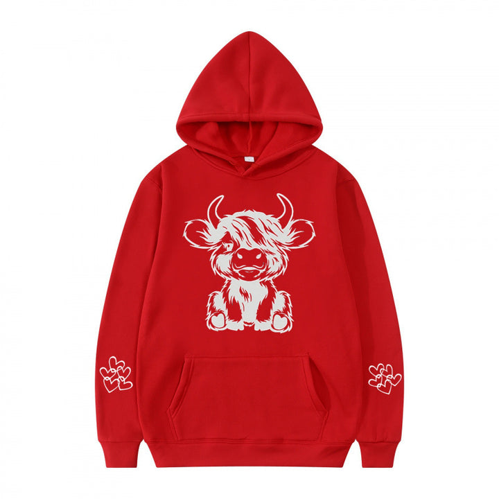 Kvindernes hætte sweatshirt med charmerende kvægmotiv og praktiske kængurulommer Skovae