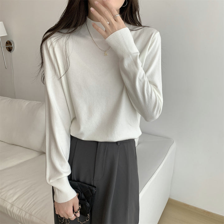 Dame finstrikket sweater med moderne ståkrave og afslappet pasform Stilla