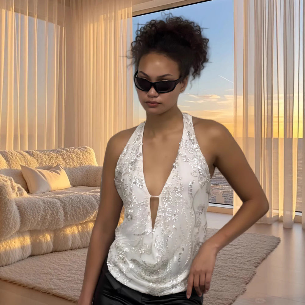 Dame funktionsbluse med glitrende pailletter og løs pasform Stilla