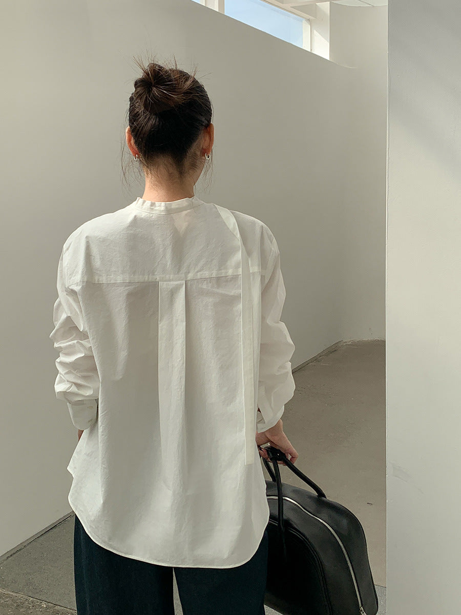 Dame longsleeve bluse med dekorativ sløjfe krave og moderne detaljer Stilla