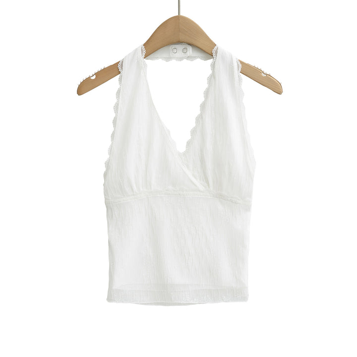Dame spids-crop-top med dyb v-udskæring og elegante flæser detaljer Stilla