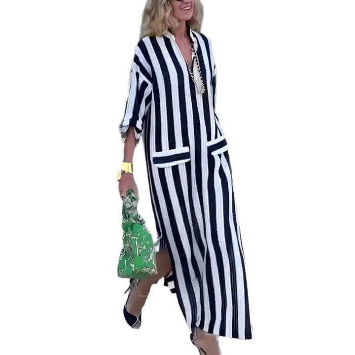 Dame med casual lang skjorte kjole med vertikale striper, V-hals, påsydd lommer og høy sideslitz Skovae