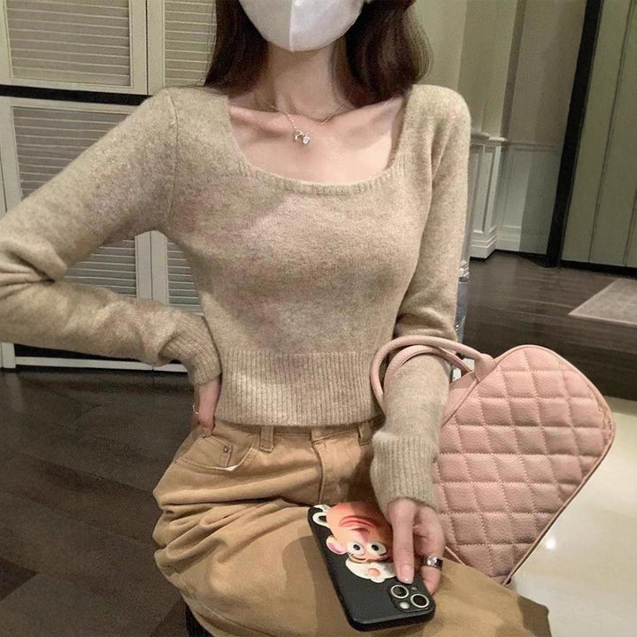 Kvinders fashionable sweater med bred rund halsudskæring og fin tekstur Stilla