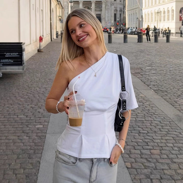 Damer asymmetrisk top med en one-shoulder design og voluminøs kant Stilla