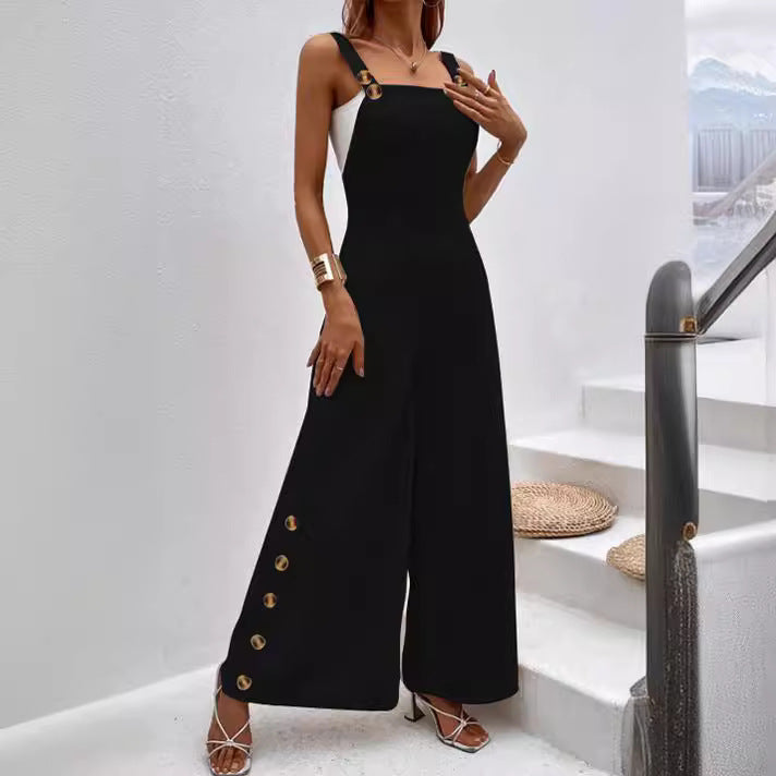Dame jumpsuit i elegant snit med dekorative knapdetaljer Stilla