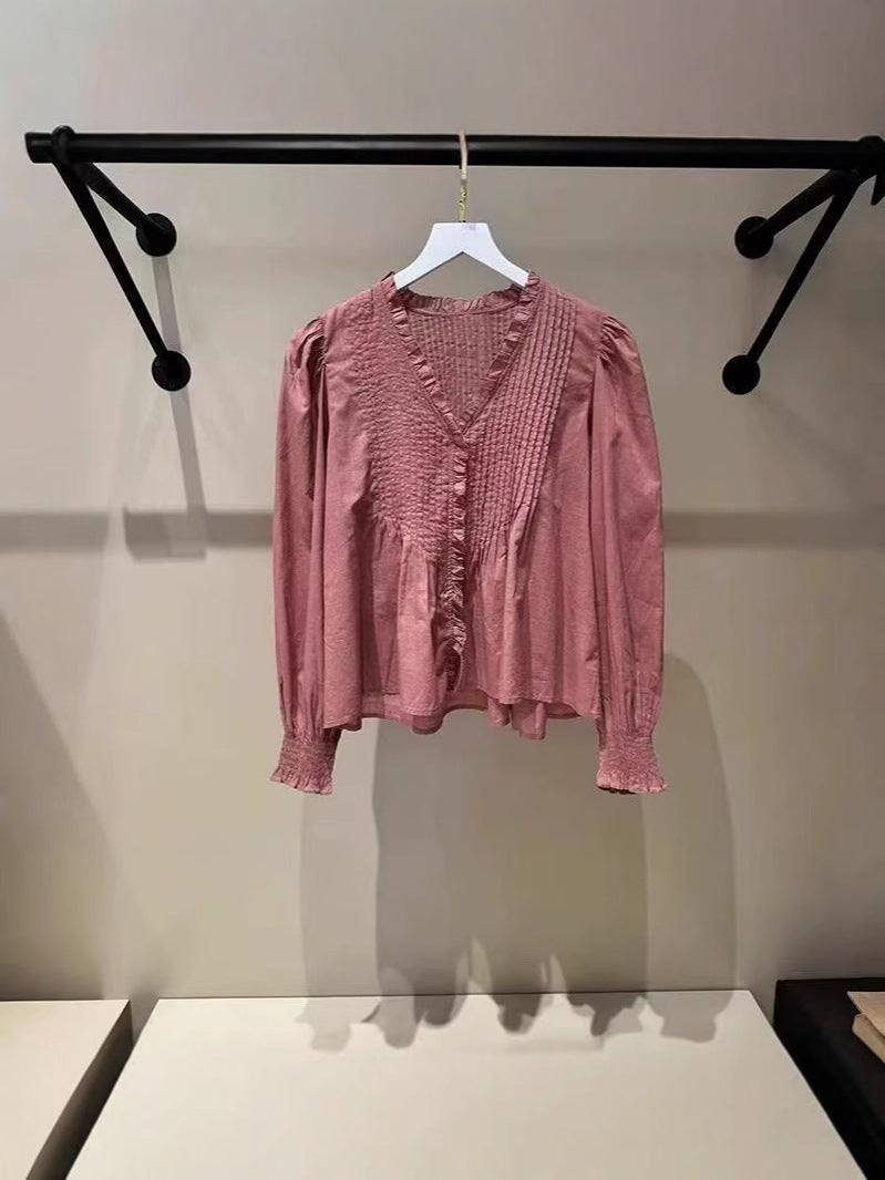Damebluse med voluminøse ærmer og fine flæsedetaljer Stilla