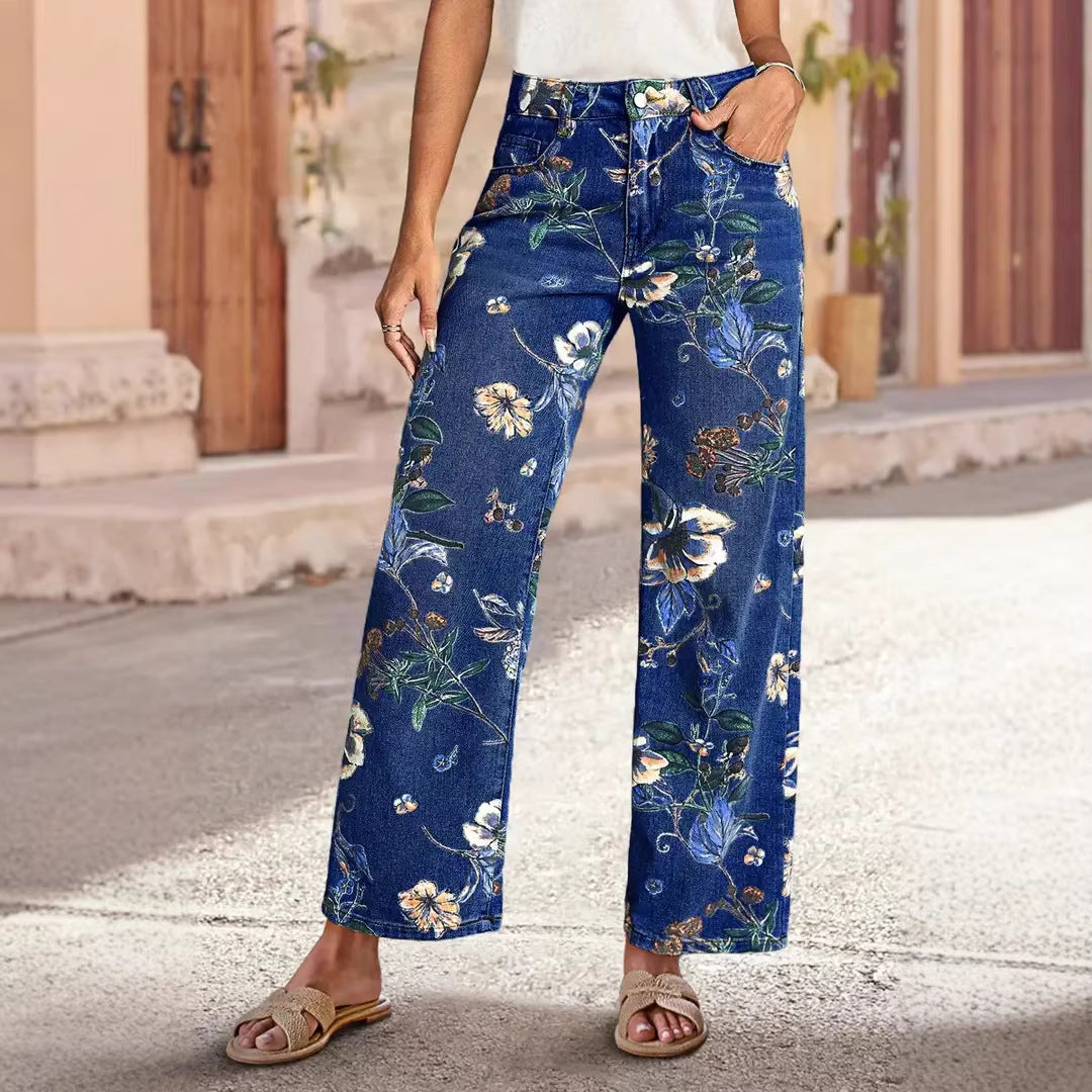 Kvindelige brede snit jeans med blomsterdesign og høj talje