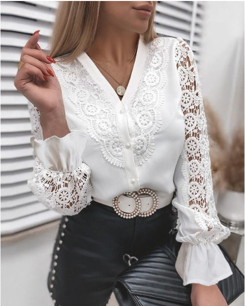 Dame spids bluse med florale ornamenter og lange ærmer Stilla