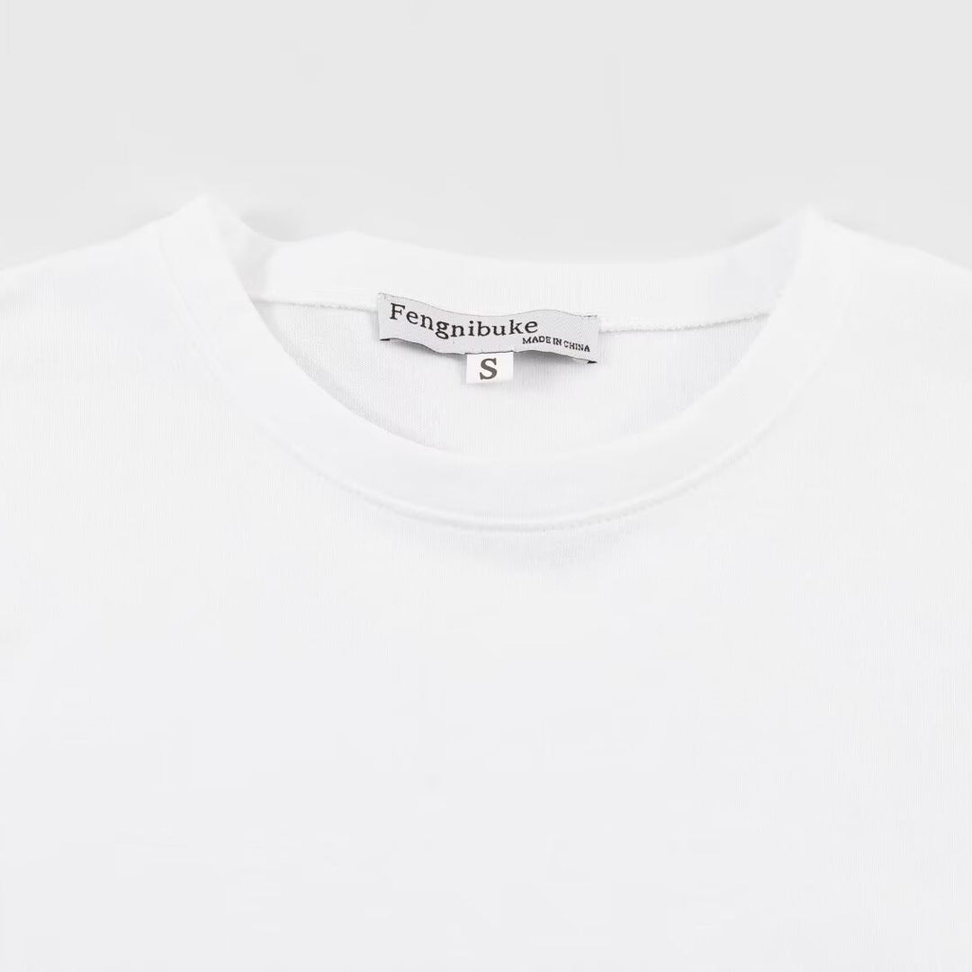 Dame T-shirt med elegant spids-snit og tidløs sløjfe-applikation Skovae