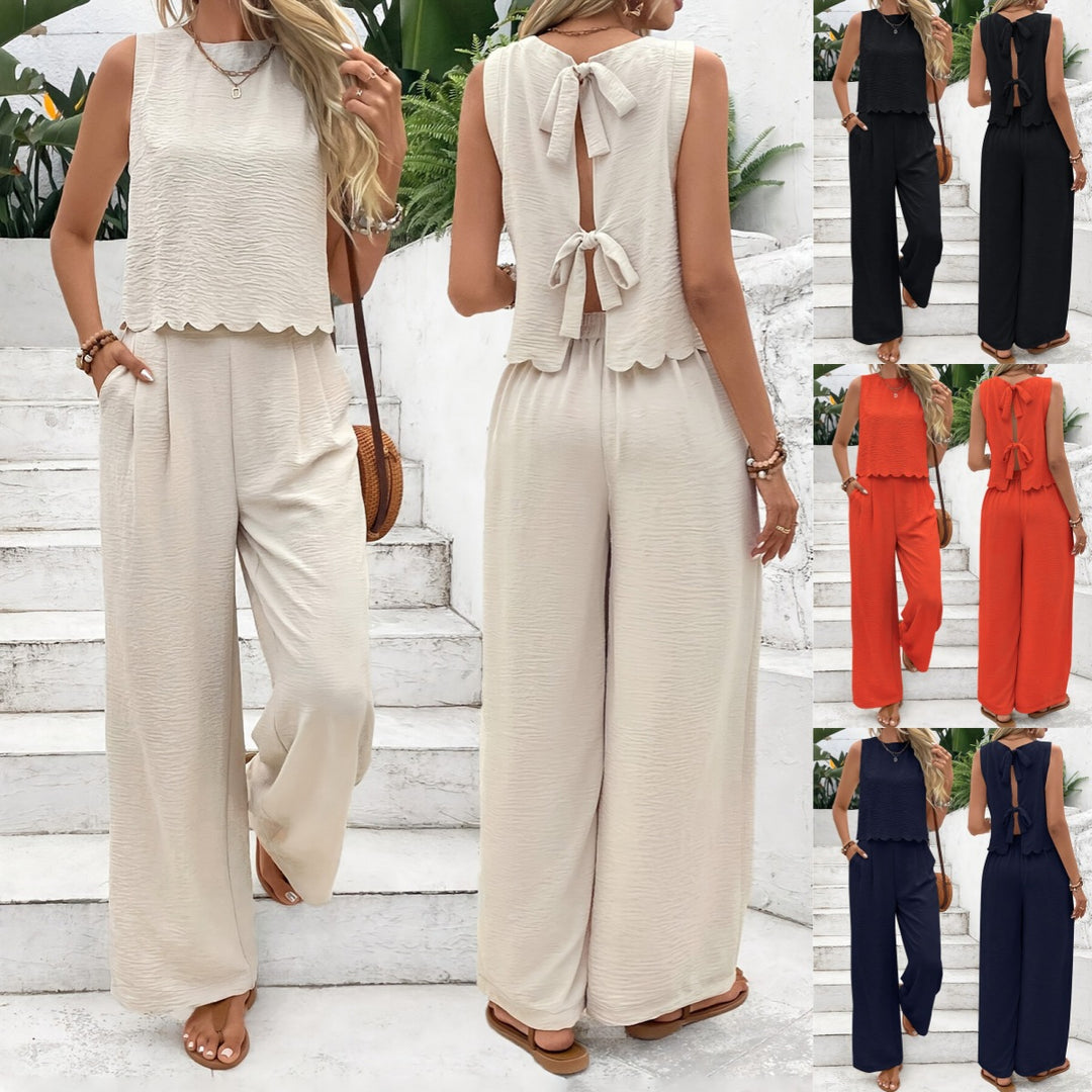 Dame afslappet jumpsuit med elegant laceindsats og bred ben Stilla