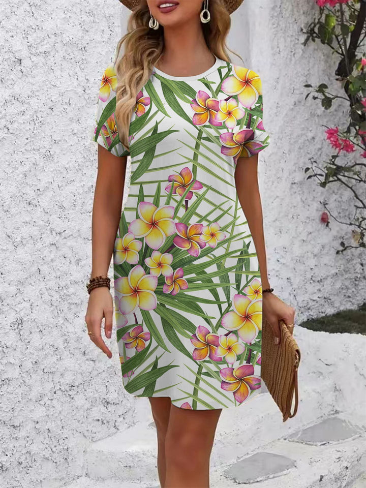 Dame komfortabel fritidskjole med livligt blomsterprint og løs pasform Skovae