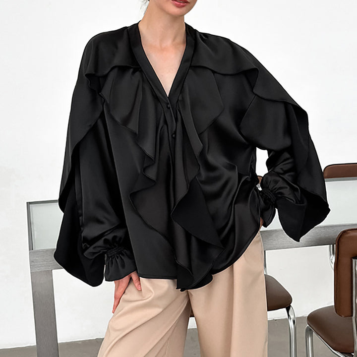 Damebluse med voluminøse flæser og elegante ærmer Stilla