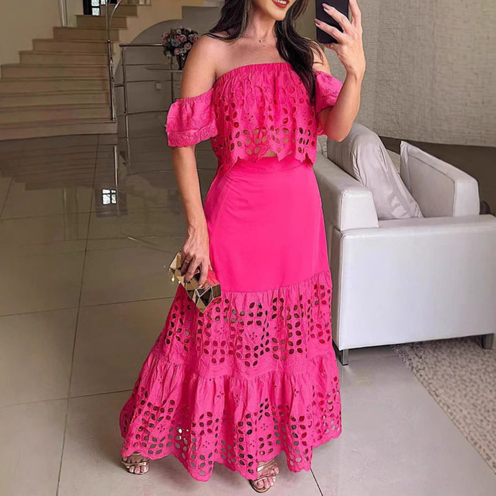 Dame Maxi-nederdel med raffineret cut-out-design og voluminøs kant Stilla