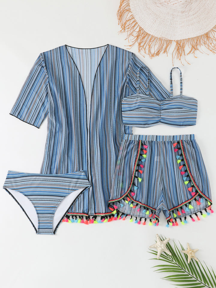 Dame strandoutfit med moderigtig tunika og shorts Skovae