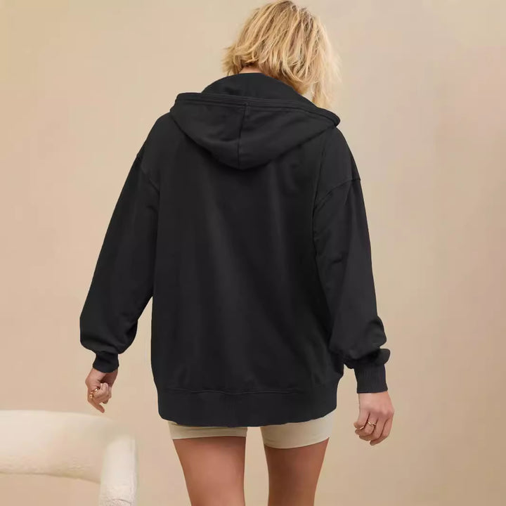 Dame Oversized Hættetrøje med halv lynlås og komfortabel pasform Stilla
