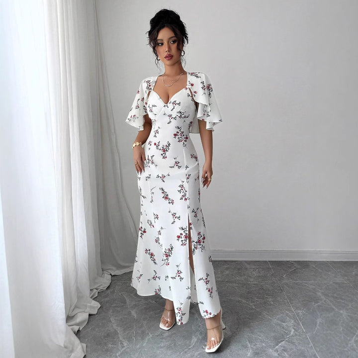 Dame maxikjole med elegante vinger og blomsterdesign Stilla