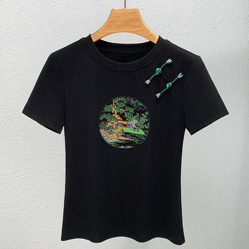 Dame T-shirt med kunstnerisk broderedesign og dekorative applikationer Stilla