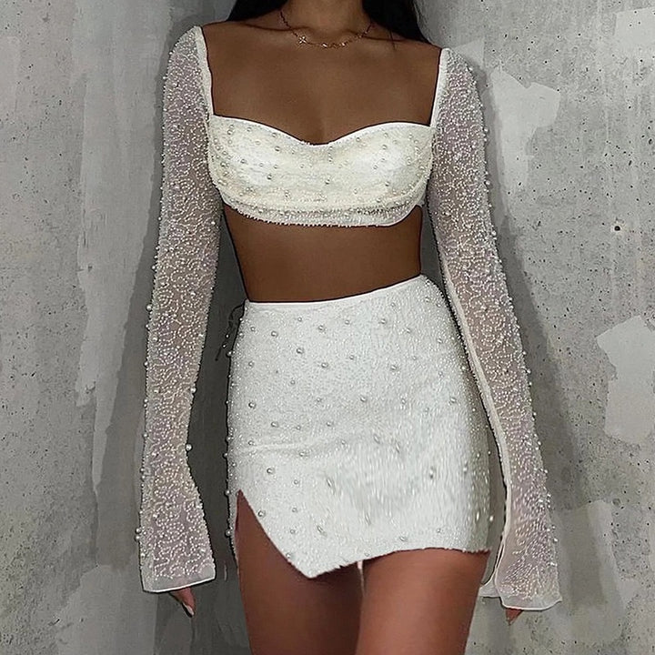 Dame Elegant Crop-top med lange, gennemsigtige ærmer og glitrende accenter Skovae