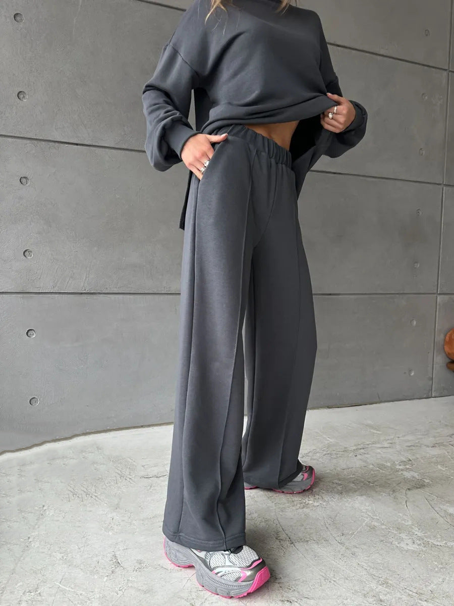 Damer elegant sweatsuit med løs pasform og stilfuld mærkedetalje Skovae
