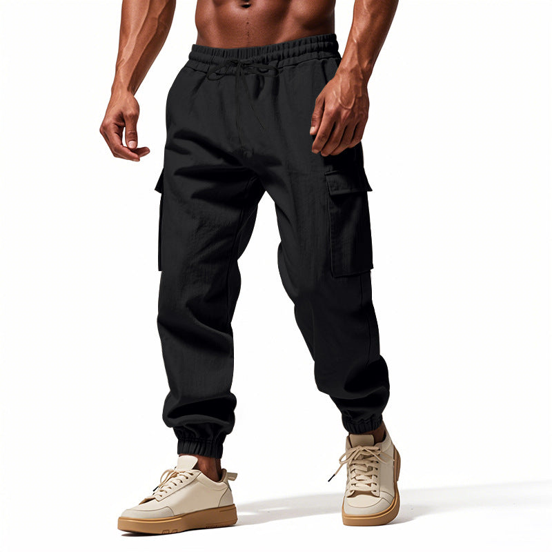 Herrer nan konisk skrånende joggere i utilitarisk stil med elastisk talje, snøre og klaplommer Skovae