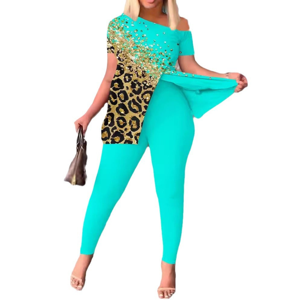 Dame figursyet jumpsuit med off-shoulder design og glamourøse accenter Skovae