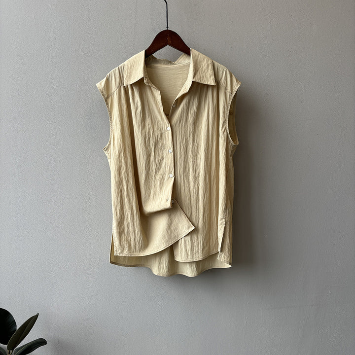 Dame casual blouse med elegant ståkrave og unik knapdetaljering Stilla