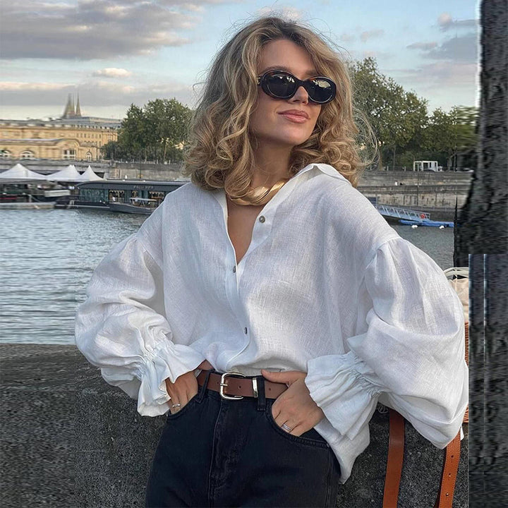 Dame hørbluse med voluminøse ærmer og elegant knapliste Stilla