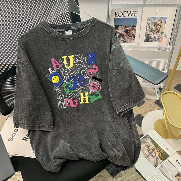 Dame T-shirt i afslappet oversized stil med kreativ grafisk tryk Stilla