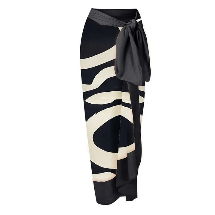 Dame bikiniset med asymmetrisk top og elegant omslagsskjørt Skovae