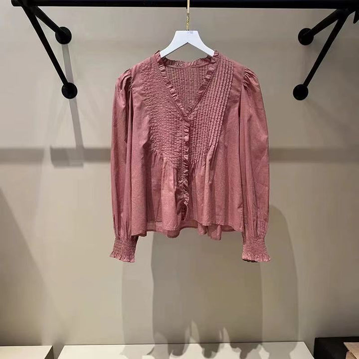 Damebluse med voluminøse ærmer og fine flæsedetaljer Stilla