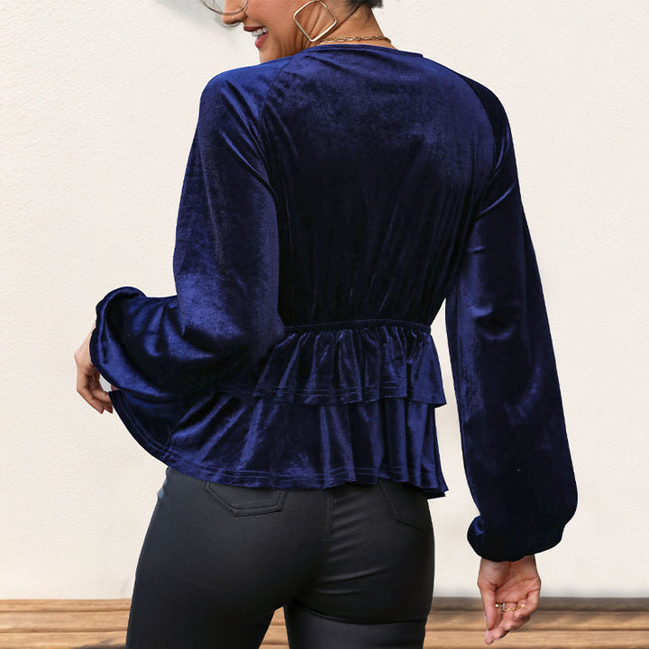 Kvinders top med voluminøs peplum og dyb V-hals Stilla