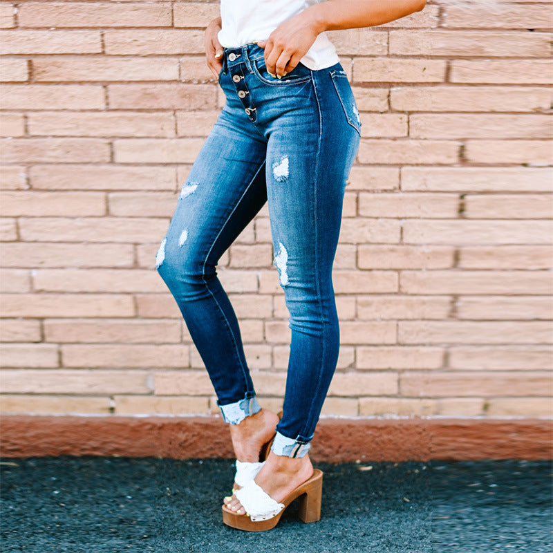 Dame High-Waist Skinny Jeans med moderne destroyed-detaljer og knaplukning Stilla