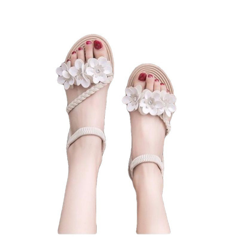 Dame nan legende Riemchensandal med fletede pyntebånd blomsterapplikationer og elastisk hælbånd Skovae