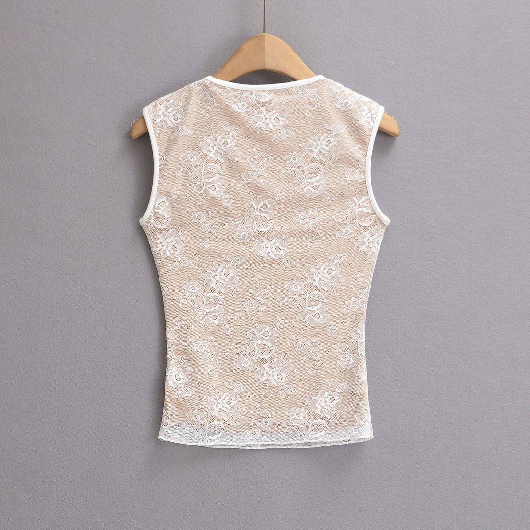 Dame spids-top med elegant udskæring og sarte florale design Stilla