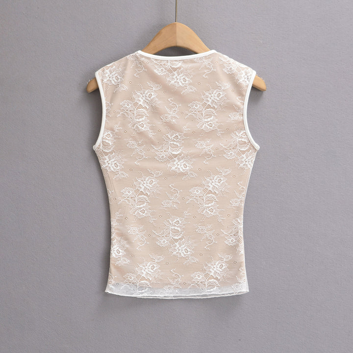 Dame spids-top med elegant udskæring og sarte florale design Stilla