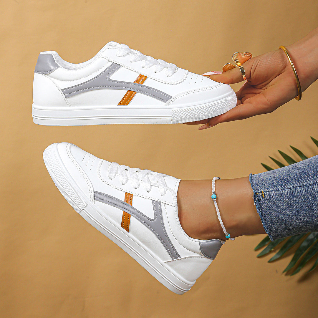 Dame Sneakers med sporty design og modeaccent Stilla