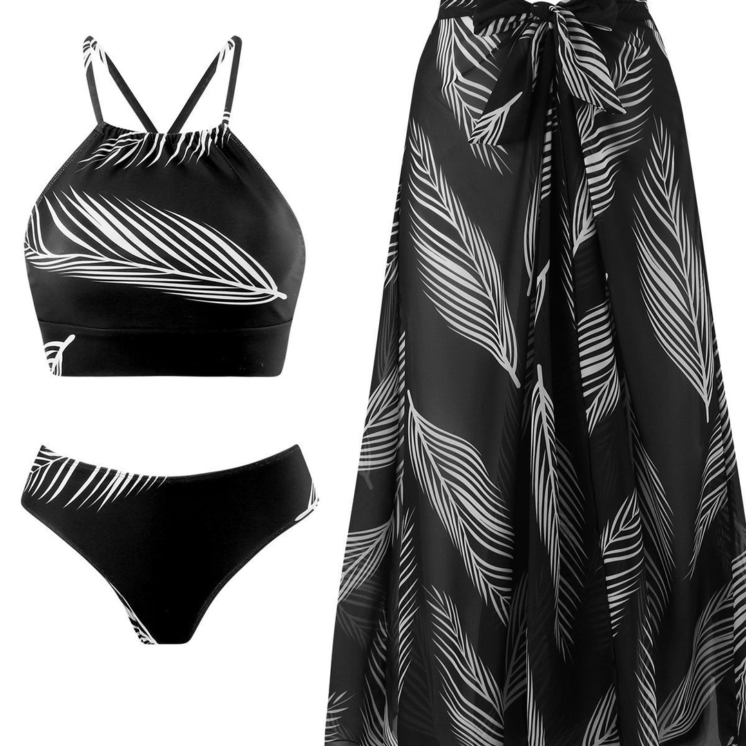 Dame bikini-sæt med stilfuld indpakningsnederdel og trendy bladdesign Stilla