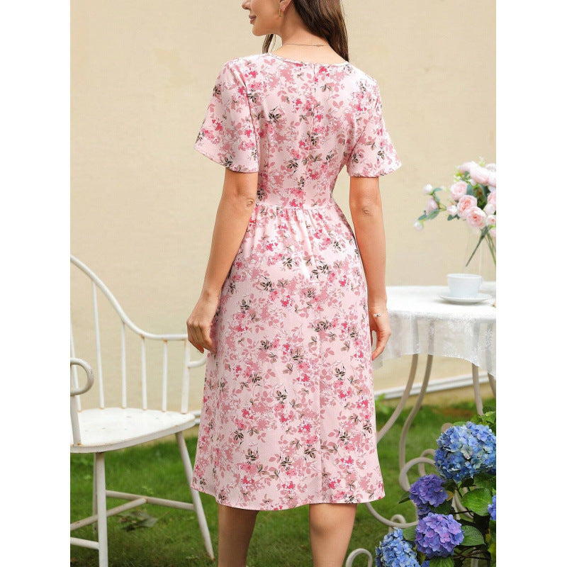 Dame Midi-Kjole med elegant blomsterdesign og figursyet snit Stilla