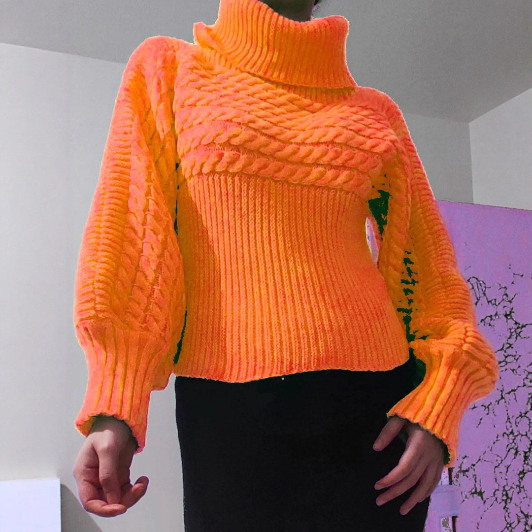 Kvinders strikkede pullover med rullekrave og struktureret design Stilla