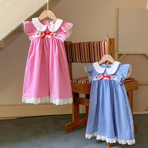 Pige vintage-inspireret gingham-kjole med broderede detaljer Stilla