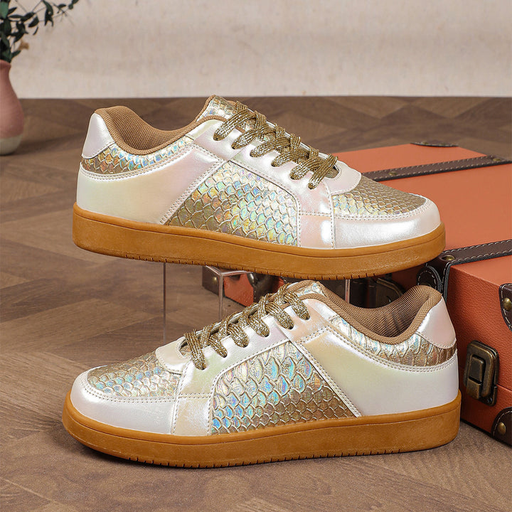 Dame Sneakers i moderne slangeskindslook Stilla