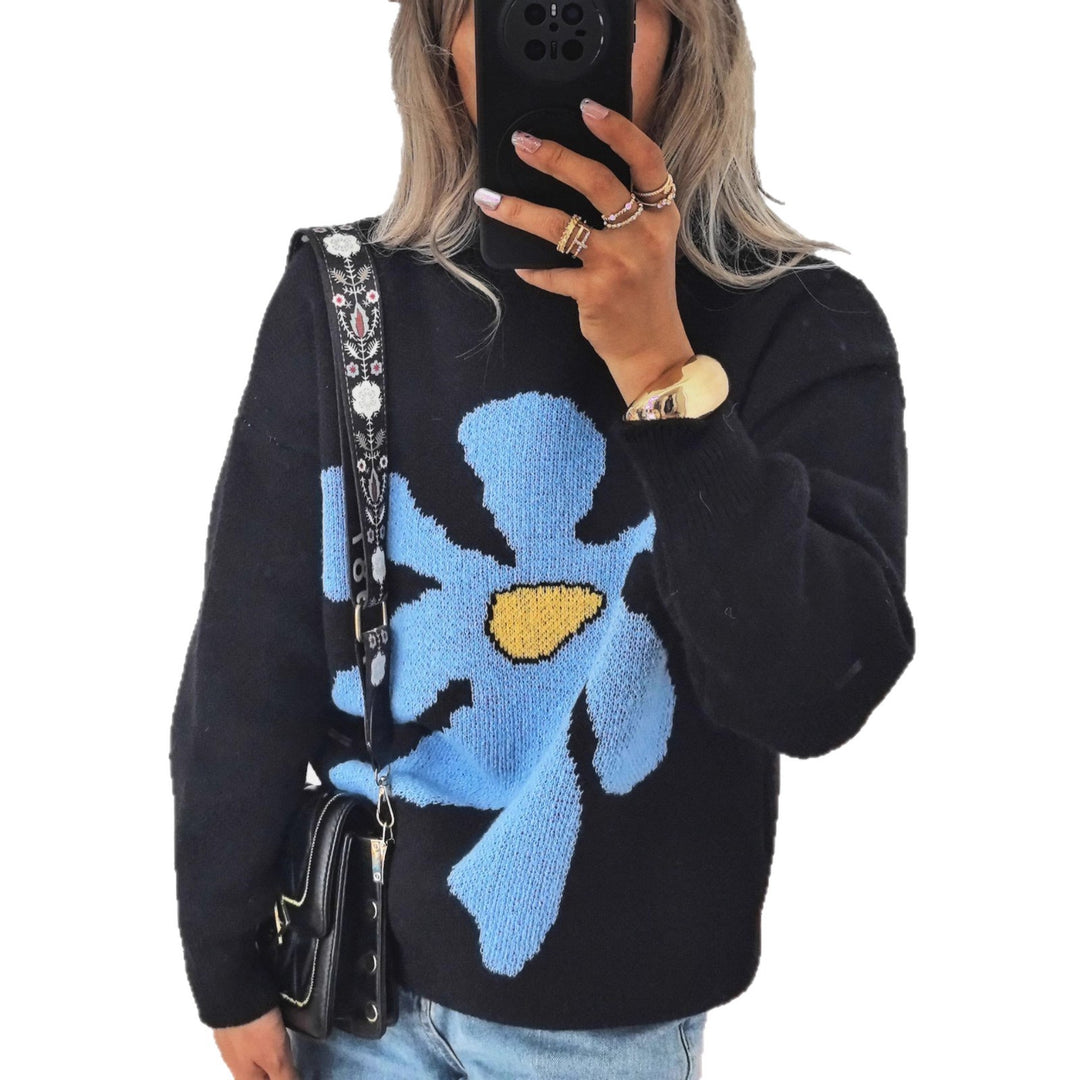 Kvinders afslappede strikket sweater med farverigt blomster mønster og sænkede skuldre Stilla